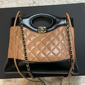 AUTHENTIC BNIB CHANEL 31 small
Black camel calfskin SOLD SOLD